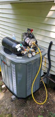 Pressure testing and pulling vacuum for proper installation of air conditioner