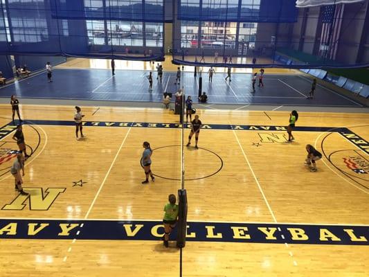 Three of four courts in air conditioned Wesley Brown Field House.