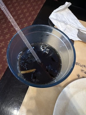 Coke that has a lo mein noddle in it