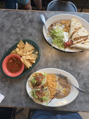 Chicken quesadilla, chicken street taco dishes and chips (homemade!) and salsa while we waited.