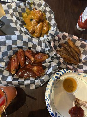 Buffalo/BBQ wings, Carolina gold wings, and fries.