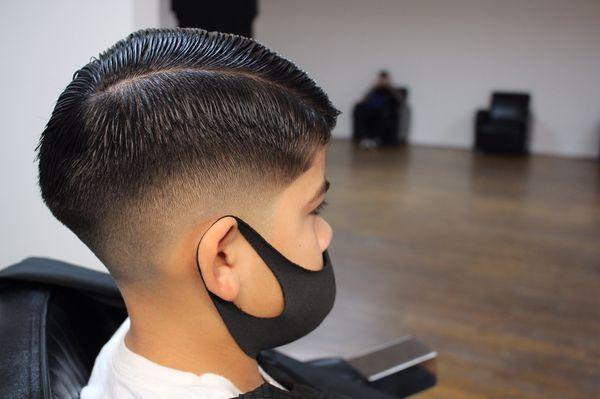 Side part with skin fade
Haircut by Leo