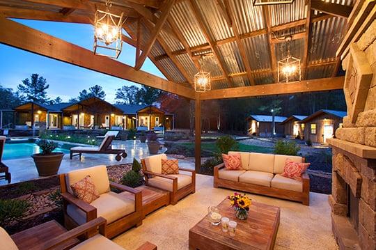 Fireplace with view of pool