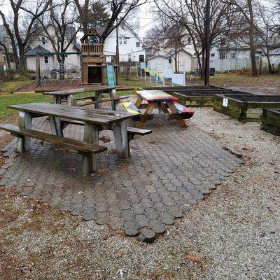 picnic tables and raised gardens