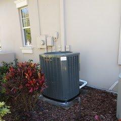 Condenser side of house