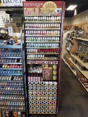 lots of paints, brushes, glues, and hobby tools to help work on your minis.