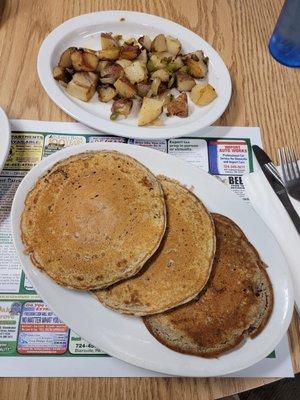 Buckwheat pancakes and homefries with onions & peppers