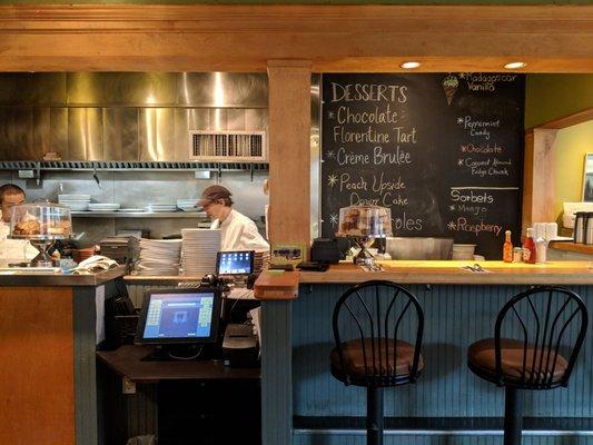 Open kitchen bar seating.