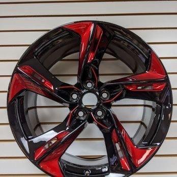 Saw this in their office custom work on a Camaro wheel looks cool! Might look into getting something like this done in the near future.