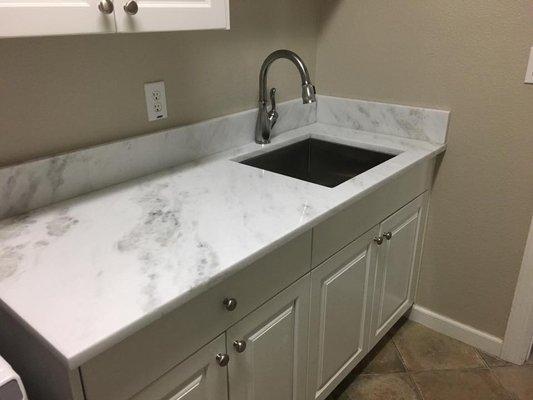 Washing station in laundry room.