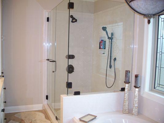 Frameless heavy glass shower door