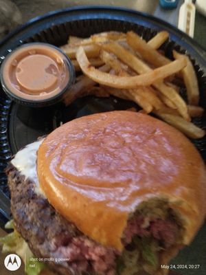 Fry's, rare very yummy amazing cheeseburger and a nice side sauce.