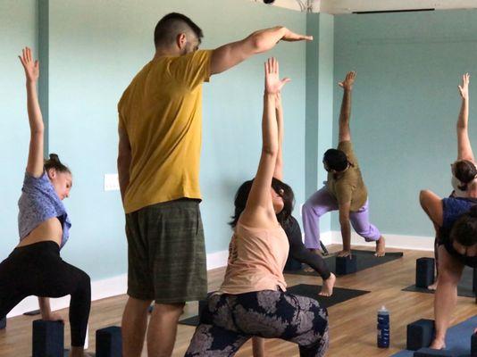 Chuck Rogers assists student during Technique classes, Monday at 6pm and Friday at 12pm, check http://www.karma.yoga for updated schedule.