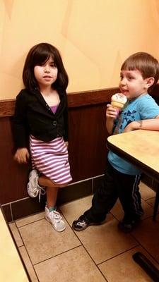 Chatting away to a soft serve cone with rainbow sprinkles!