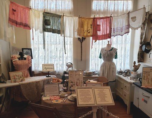 An exciting display of antique aprons. LOL!