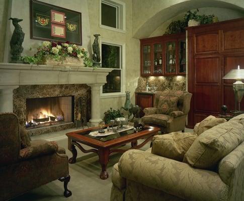 Traditional Family Room Interior featuring custom Fireplace Design, Custom Cabinetry Design and Custom Upholstery.