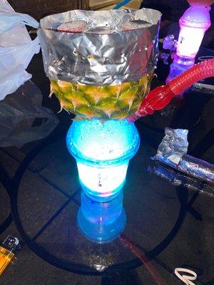 Regulat hookah cup with a pineapple head flavors mixed safari melon dew and irish peach