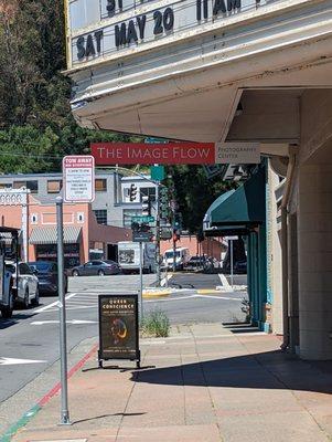 Front of the business just below old movie theater.