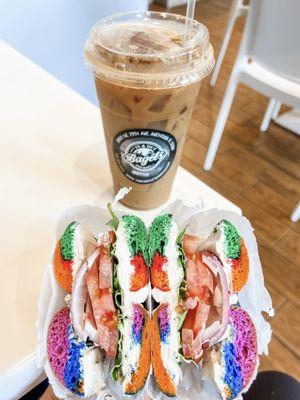 Rainbow bagel with vegan/tofu cream cheese & french vanilla iced oat milk latte