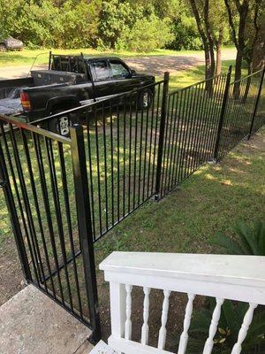 New Installation of a Wrought Iron Fence.