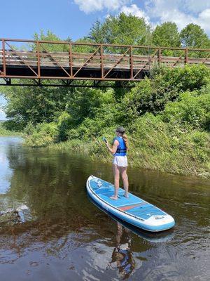 Teenager on paddle board.