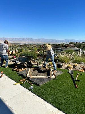 Concrete slab for custom sculpture 
Working hard