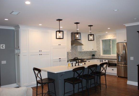 Our whole kitchen with the island counter top as well. Back splash and both counter tops from S&C S