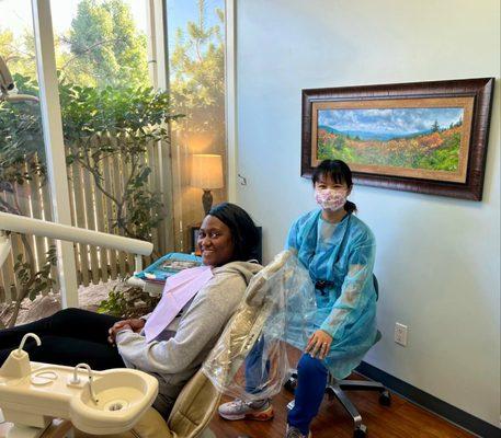 Beautiful dentist with her patient