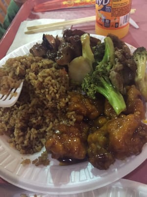 Rice, beef and broccoli, BBQ chicken, and orange chicken.