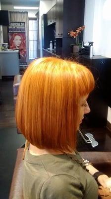 Vibrant copper red with highlights on an A line bob. Call (619)280-9611 ask for Dawn at Diesel Salon on Adams Ave. (619)280-9611