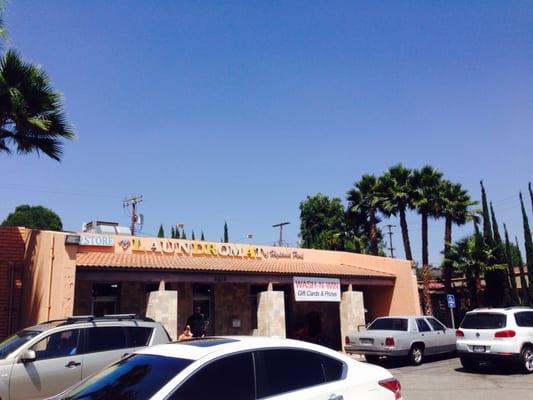 1960s signage with accompanying palm trees