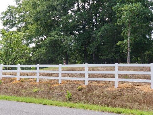 Three rail cattle fence