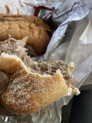 Hair in cheesesteak . No health standard