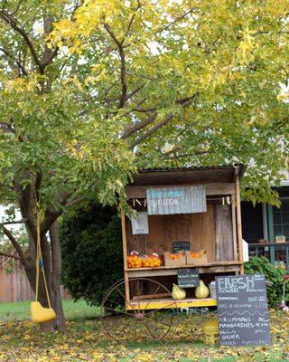 Adorable produce/fruit stand.