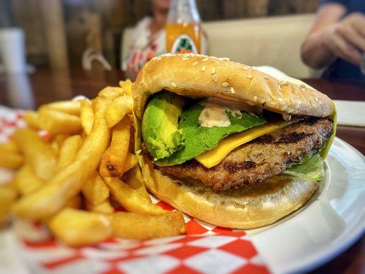 Avacado Cheeseburger with fries..