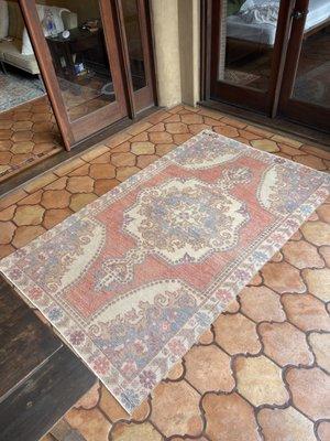 A antique hand knotted rug