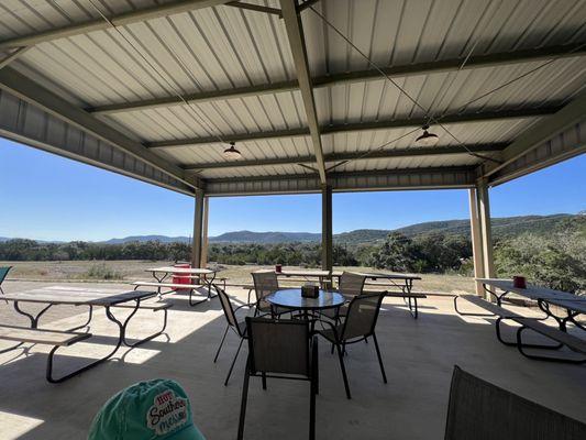 Covered outdoor seating with a view.