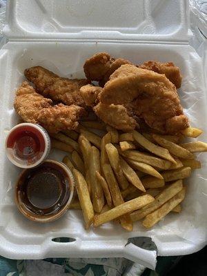 Chicken tenders and fries, ketchup, BBQ sauce