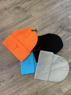 Embroidery on beanies.