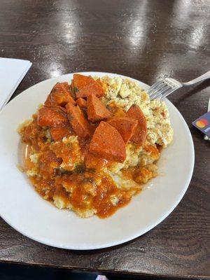 Mangu, scrambled eggs and salchichón en salsa