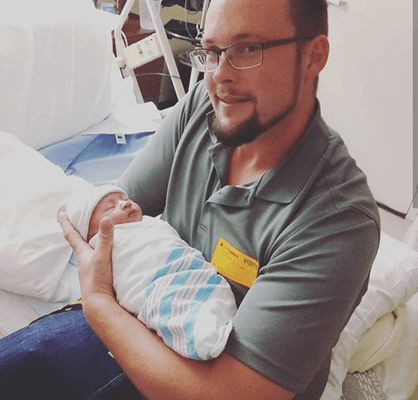 Daddy with Skylar at Holy Cross after she was delivered