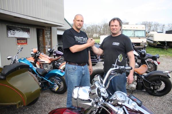 Owner Mark Johnson at Cafe Custom Cycles one of Runkle's long-time customers!