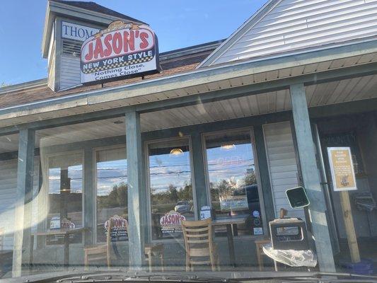 store front with outdoor seating