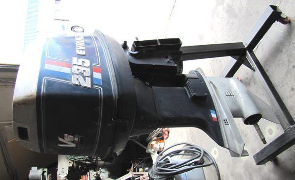 We specialize in outboard motor servicing and installation. Pictured: 235HP Evinrude