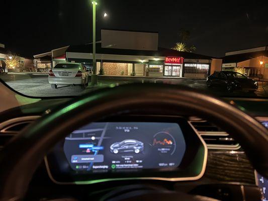 BevMo right in front of the superchargers to pick up essentials while you charge