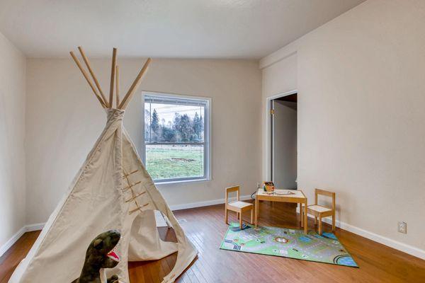 Huge bedroom with great light from window