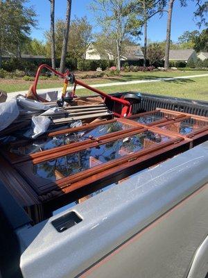 Junk Removal. Load: China Cabinet, 2 metal canopies. Secured and removed!