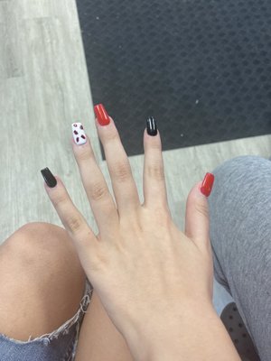 red and black leopardprint nails