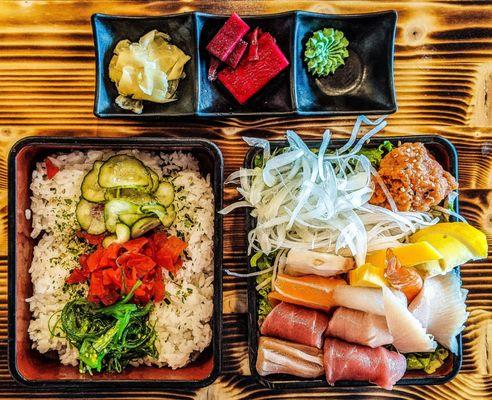 Lunch chirashi with side of pickles, ginger and wasabi.