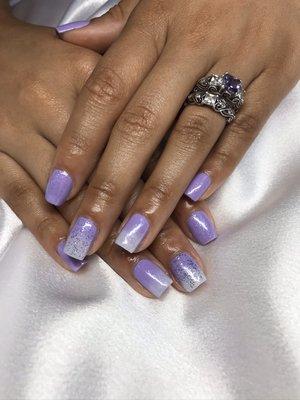 Gel manicure with ombré and glitter design